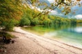 Bohinj lake, Triglav national park, autumn landscape, Slovenia. Scenic view of the water, mountains and forest, travel background Royalty Free Stock Photo