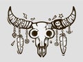 Boho chic. Ethnic tattoo style. Native american or mexican bull skull with feathers on horns.