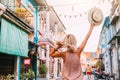 Boho girl walking on the city street