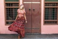 Boho girl walking on the city street