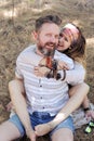 Boho style beautiful joyful couple, indie style, hipster outfit, bohemian outfit, woman embracing man