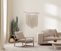 Boho style interior in earth tones, beige wall, armchair and sofa, decor and cactus, macrame on wall, 3d render