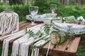 Boho style wedding reception dinning table with macrame tablecloth Royalty Free Stock Photo