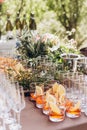 Boho wedding table with eco decor for guests.