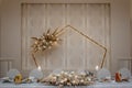 Boho wedding table set with the wedding hexagon arch, vintage dining table with decorations, flowers and pampas grass in Royalty Free Stock Photo