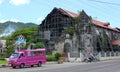 Bohol island,Philippines. Jeepney parking and old ruined church