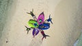 Bohol, Philippines - A bunch of tourists lay on the sand and enjoying the tropical waters of a sandbar.