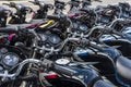 Bohol, Philippines - Rows of Kawasaki Bajaj 125 motorcycles for sale at a dealership. Motorbikes at an outdoor lot