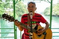 Bohol, Philippines - September 11 2019: A singer on a floating tourist boat and restaurant on Bohol river.