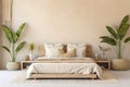 Bohostyle Bedroom With Beige Kingsize Bed And Tropical Plant