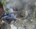 Boil eggs in hot spring in tengchong, yunnan, china