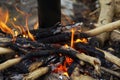 Boil hot water with bamboo tubes by fire from the firewood