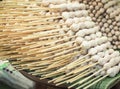 Boiled beef meatballs on skewers ready for sale. Royalty Free Stock Photo