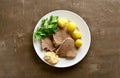 Boiled beef with potatoes and horseradish