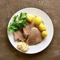 Boiled beef with potatoes and horseradish