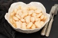 boiled big white beans with sauce on white bowl Royalty Free Stock Photo