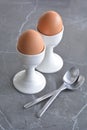 Boiled brown eggs white eggcups