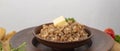 Boiled buckwheat porridge with butter in bowl Royalty Free Stock Photo