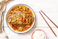Boiled Carp fish with pickled lettuce