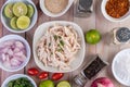 Boiled chicken cut into pieces in a white dish on a wooden table Royalty Free Stock Photo