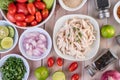 Boiled chicken cut into pieces in a white dish on a wooden table Royalty Free Stock Photo