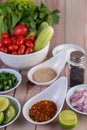 Boiled chicken cut into pieces in a white dish on a wooden table Royalty Free Stock Photo