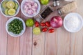 Boiled chicken cut into pieces in a white dish on a wooden table Royalty Free Stock Photo