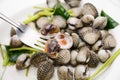 Boiled cockles or scallops with seafood sauce