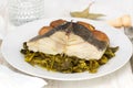 Boiled cod fish with potato and greens Royalty Free Stock Photo