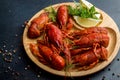 Boiled cooked crayfish crawfish ready to eat on wooden plate on Royalty Free Stock Photo