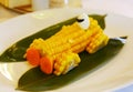 Boiled corn car with carrot frontlights Royalty Free Stock Photo