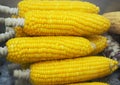 Boiled corn cobs on the market