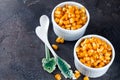 Boiled corn kernels in white cups Royalty Free Stock Photo