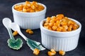 Boiled corn kernels in white cups Royalty Free Stock Photo