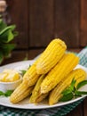 Boiled corn with salt and butter. Royalty Free Stock Photo