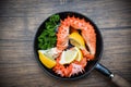 Boiled crab claws cooked on pan with Alaskan King Crab Seafood on dining table - red crab hokkaido Royalty Free Stock Photo