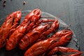 boiled crayfish on a black plate Royalty Free Stock Photo