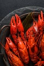 boiled crayfish on a black plate Royalty Free Stock Photo
