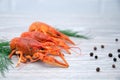 Boiled crayfish with dill and peas on the table. Royalty Free Stock Photo