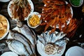 Boiled crayfish, salted fish, snacks on a wooden table Royalty Free Stock Photo