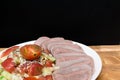 boiled cutting raw tongue with salad on white plate