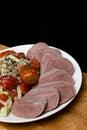 boiled cutting raw tongue with salad on white plate