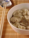 Boiled dumplings with meat filling in soup