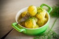 boiled early potatoes with butter and fresh dill in a bowl Royalty Free Stock Photo