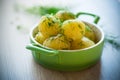 boiled early potatoes with butter and fresh dill in a bowl Royalty Free Stock Photo