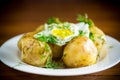 Boiled early potatoes with fried egg and dill Royalty Free Stock Photo