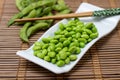 Boiled edamame soy beans on plate