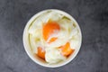 Boiled egg on bowl on dark table background - Soft boiled eggs Royalty Free Stock Photo