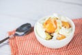 Boiled egg on bowl with sauce for breakfast on the table background - Soft boiled eggs Royalty Free Stock Photo