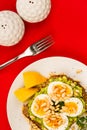 Boiled Egg on Crushed Avocado With Pine Nuts And Rye Bread Open